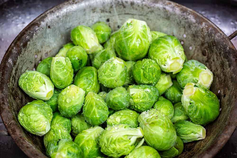 Quite possibly my favorite way to eat Brussel sprouts! They come together FAST and taste AMAZING! #BrusselSprouts #roastedbrusselsprouts #howtoroast #eastervegetable #iambaker How to Prepare Brussel Sprouts