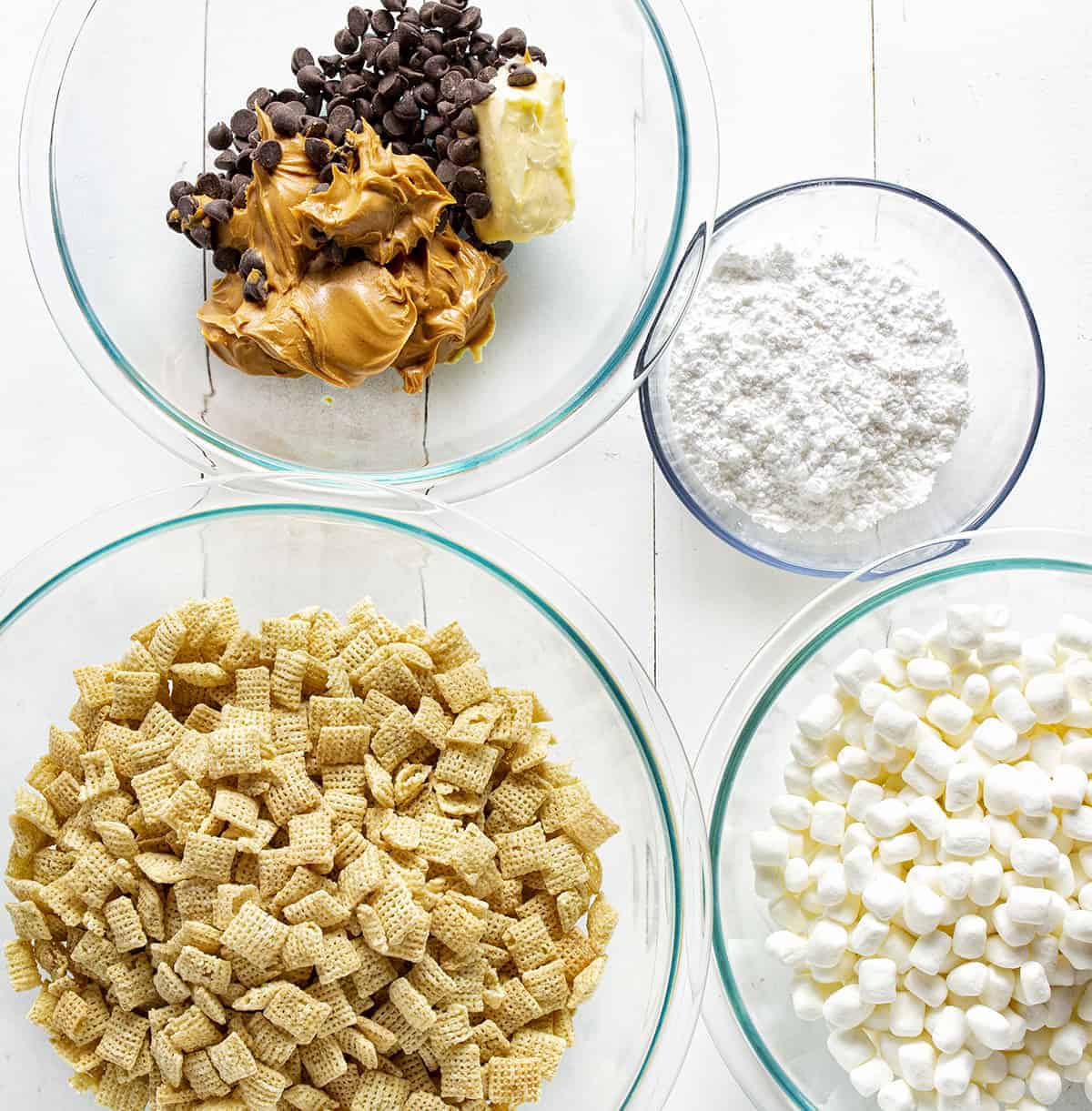 Stack of yummy Puppy Chow Bars #puppychow #puppychowbars #muddybuddies #monkeybunch #puppychowbarrecipe #ricechex #ricechexcereal Ingredients for Puppy Chow Bars
