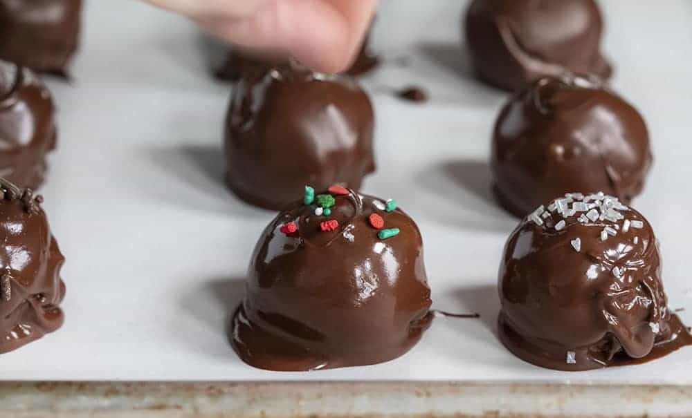 Buttercream Candies are treats with a soft and creamy buttercream filling dipped and covered in melted chocolate. How to Make Chocolate Covered Candy, Candy, Buttercream Candy, recipes, i am baker, iambaker, chocolate covered candy, dessert Sprinkles on Buttercream Candy