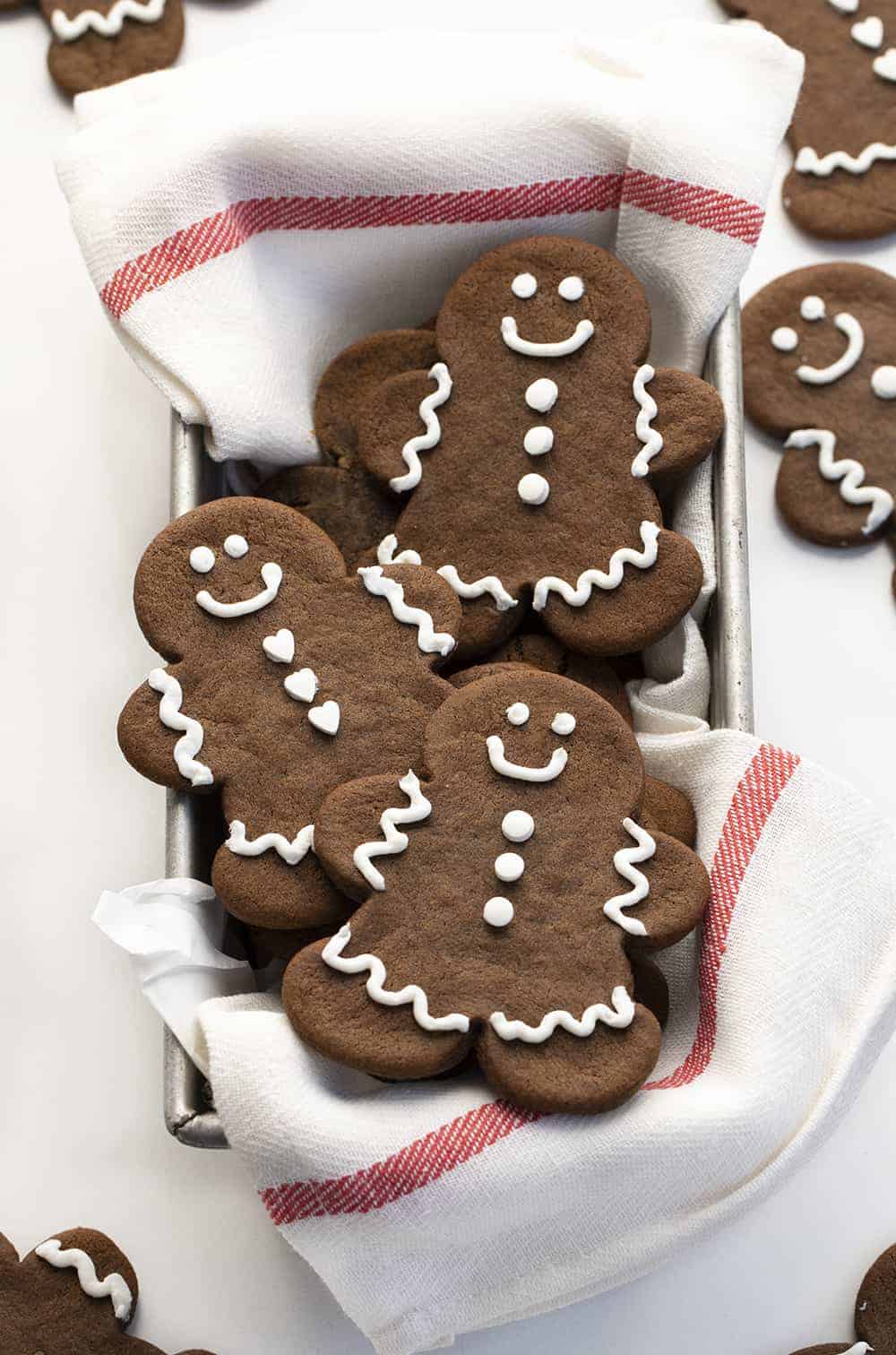 Gingerbread Man Cookie is a cut-out cookie full of ginger, cinnamon, and molasses flavor, decorated as creatively as you like! How to Make Ginger Bread Man Cookies, Gingerbread Cookies, Gingerbread Man Cookies, Baking, Christmas Holidays, Cookies, Recipes, Cookie Recipes, i am baker, iambaker, gingerbread Basket of Gingerbread Man Cookies